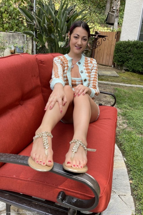 Sexy brunette Lily Adams spreads her trimmed pussy up close outdoors