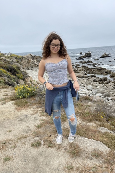 Petite amateur teen with glasses Leana Lovings showing her holes up close