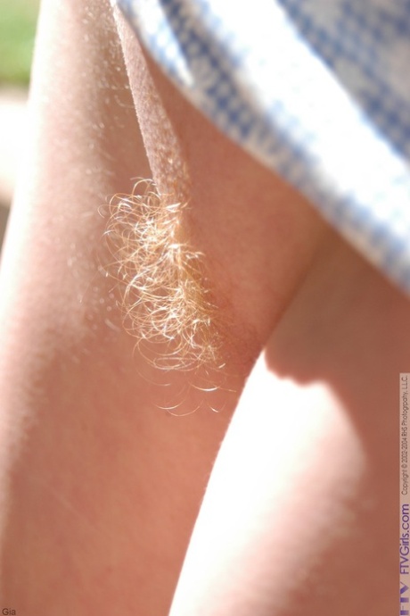 Sweet amateur Juliet spreads her ass cheeks and flaunts her hairy pussy