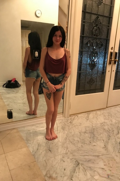 Petite teen Rosalyn Sphinx shows off her big booty & her tiny tits