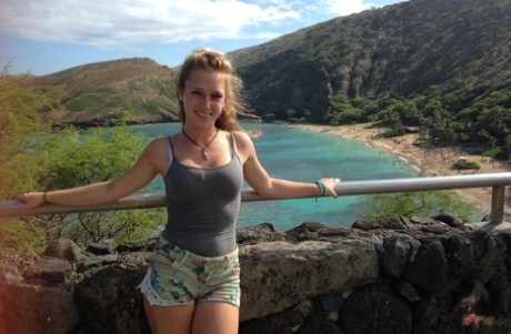 Amateur girlfriend Taylor Whyte poses in a tight shirt & shorts by the sea