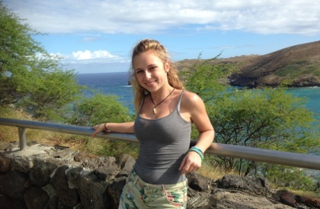 Amateur girlfriend Taylor Whyte poses in a tight shirt & shorts by the sea