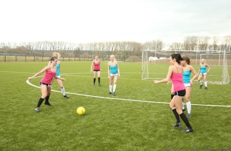 Soccer girls show their bodies at the field before lesbian orgy in a shower