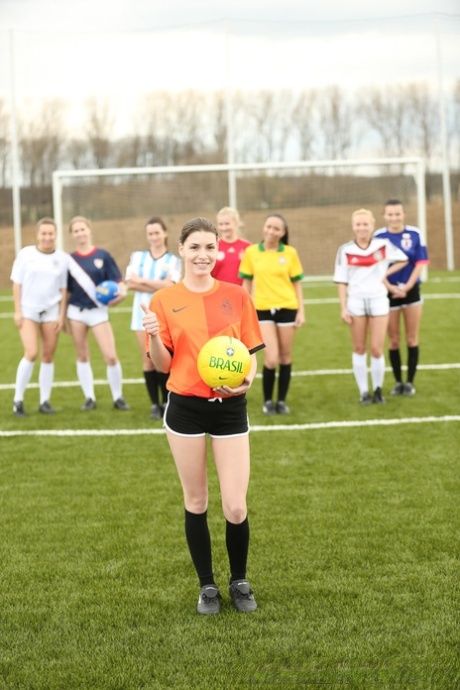 Soccer girls show their bodies at the field before lesbian orgy in a shower