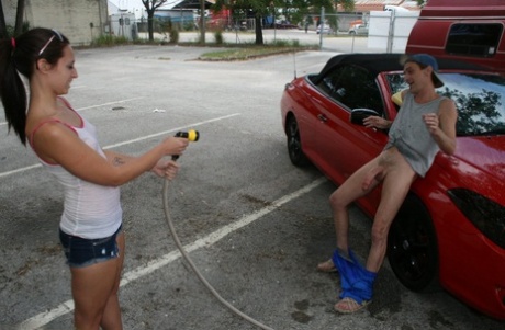 Naughty teen teases with her tiny tits & gives a hung carwash guy a handjob