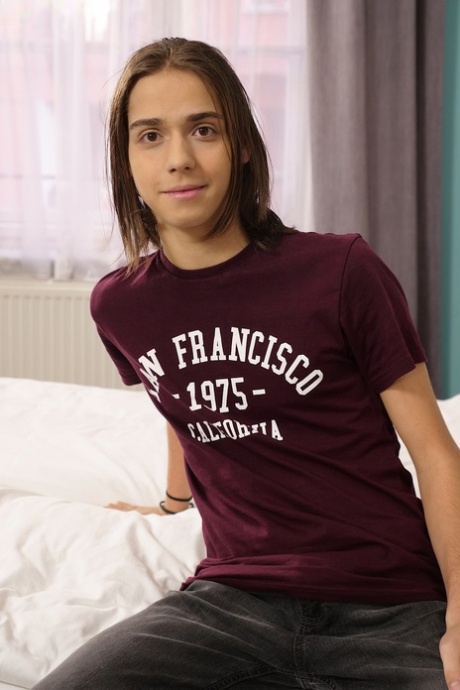 Adorable gay boy Jake Olsen unveils his lean body and shows his big uncut dick