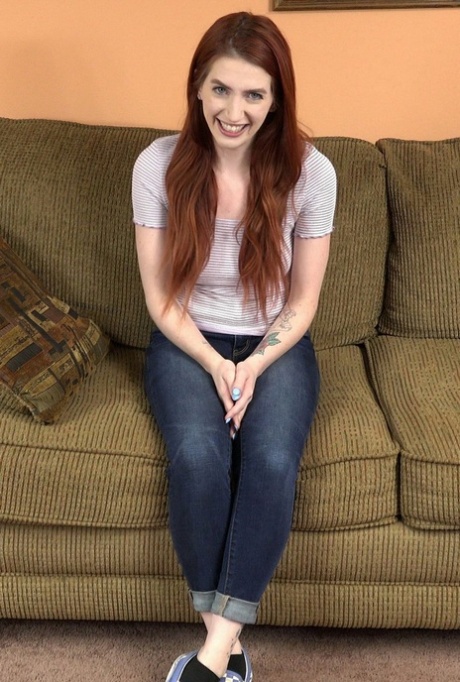 Ginger beauty Aria Carson strips, kneels down & sucks & deepthroats a dick