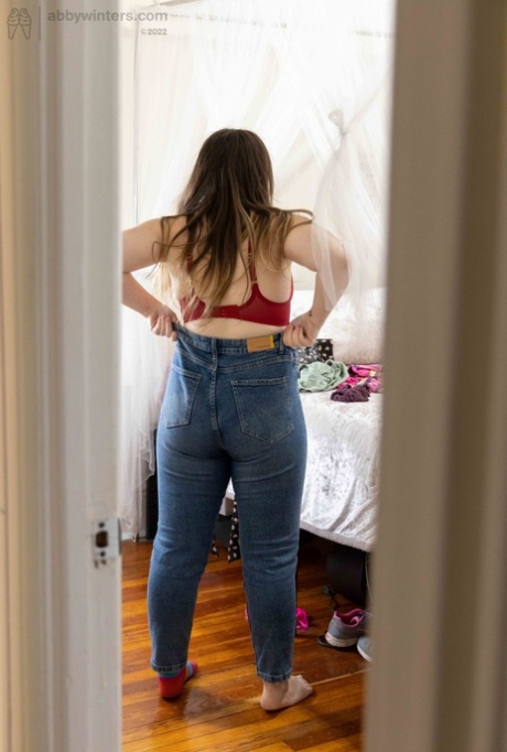 Chubby amateur Paige E shows off her backside while getting dressed
