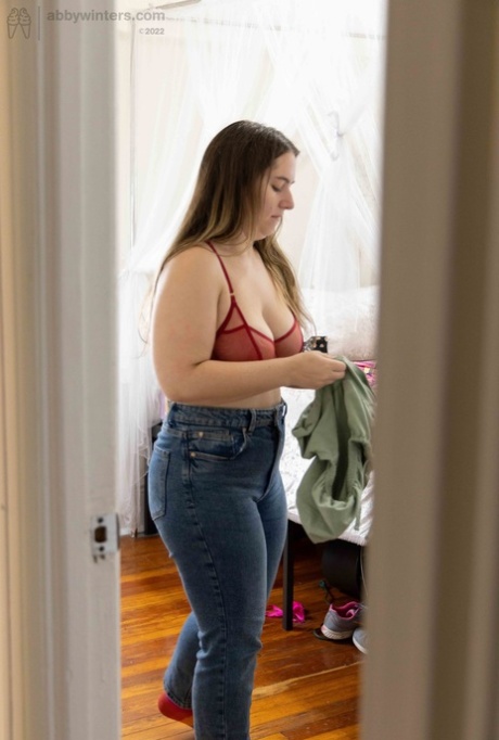 Chubby amateur Paige E shows off her backside while getting dressed