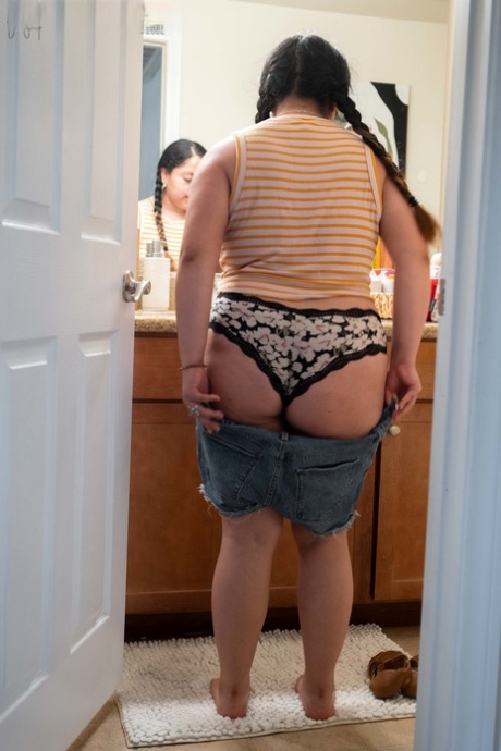 Chubby amateur Lola L shows her hairy pussy & her big ass while dressing