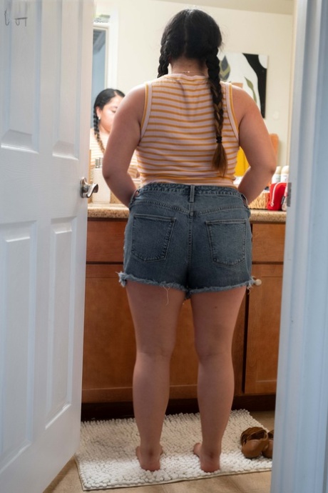 Chubby amateur Lola L shows her hairy pussy & her big ass while dressing
