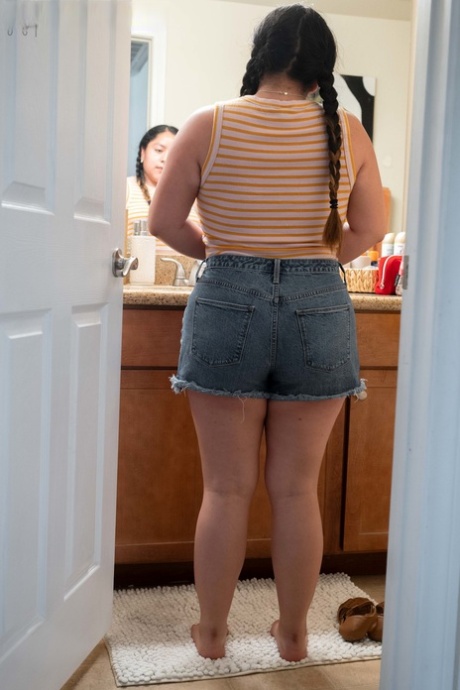 Chubby amateur Lola L shows her hairy pussy & her big ass while dressing