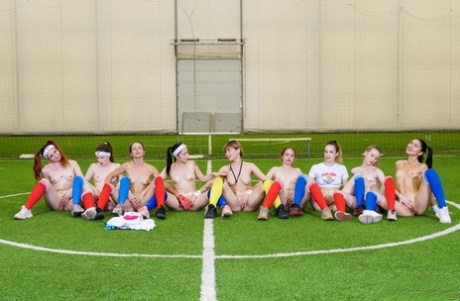 Skinny teen soccer players undressing and rubbing each other's muffs
