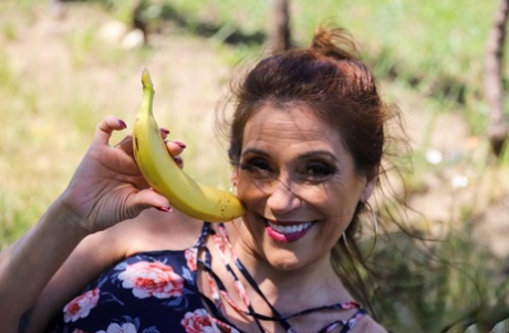 Inked mature Melissa Johnson gets her twat eaten and fucked in outdoor action