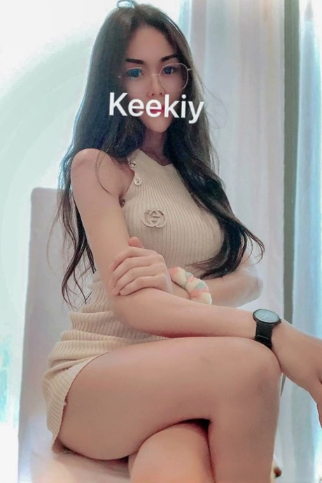 Sexy Asian shemale shows off her perfect body in pretty outfits