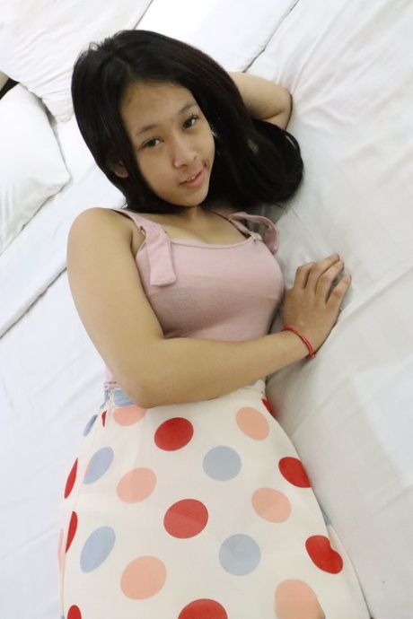 Petite Asian amateur Pangpang exposes her round ass and takes a dick in POV