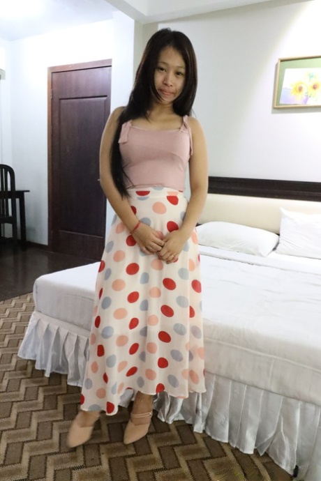Petite Asian amateur Pangpang exposes her round ass and takes a dick in POV