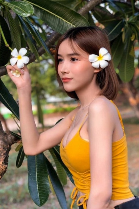 Sexy Asian shemale with a stunning ass Bella poses in hot outfits