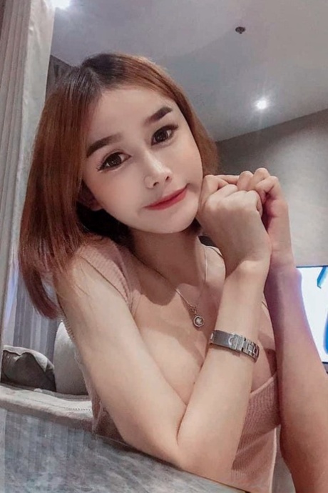 Sexy Asian shemale with a stunning ass Bella poses in hot outfits