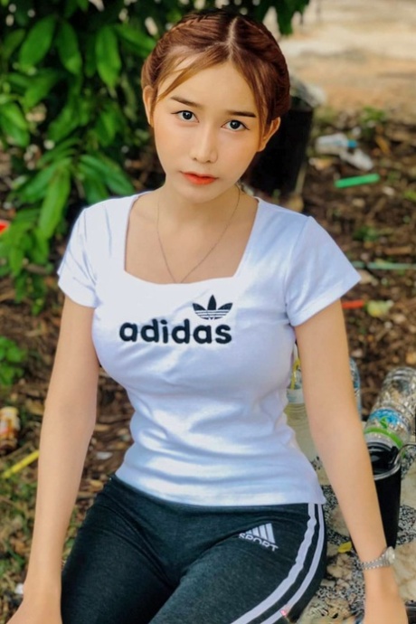 Sexy Asian shemale with a stunning ass Bella poses in hot outfits