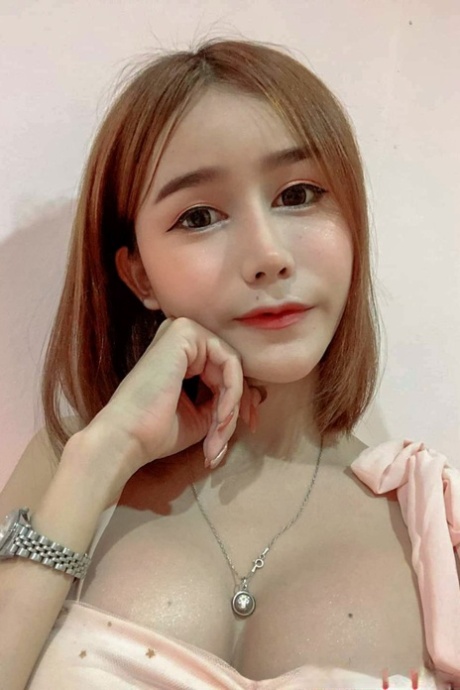 Sexy Asian shemale with a stunning ass Bella poses in hot outfits