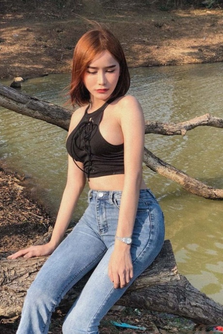 Sexy Asian shemale with a stunning ass Bella poses in hot outfits