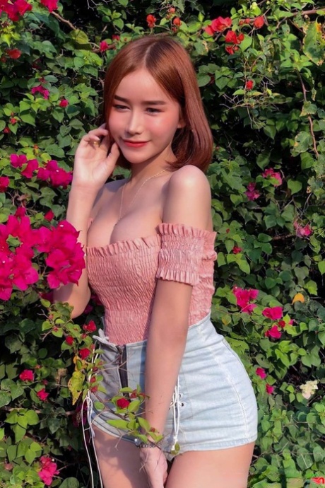 Sexy Asian shemale with a stunning ass Bella poses in hot outfits