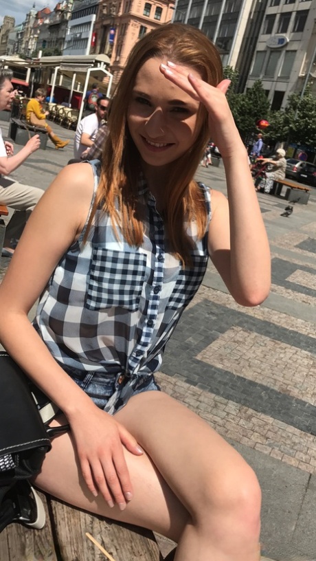 Sexy redhead Radka shows off her petite body while stripping for some POV sex