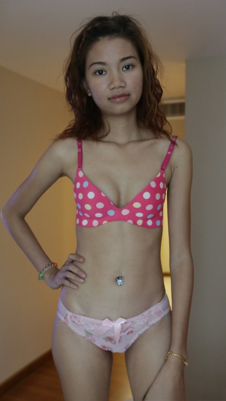 Slender Asian babe Oay B unveils her hairy pussy and gets fucked in POV