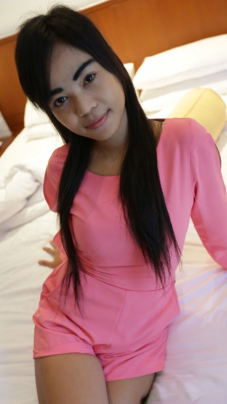Beautiful Asian babe May D shows off her big natural tits during a POV fuck