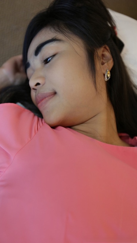 Beautiful Asian babe May D shows off her big natural tits during a POV fuck