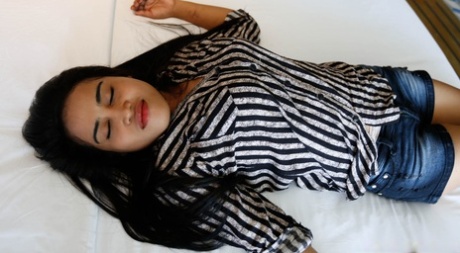 Petite Asian beauty Icha gets her hairy muff stretched in a POV fuck session