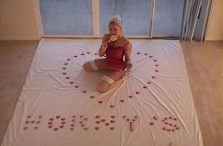 Blonde MILF with a big ass gives head and gets fucked from behind