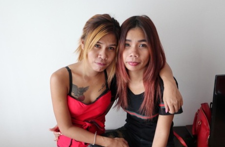 Kinky Asian babes Kuai & Jem tease with their inked bodies together