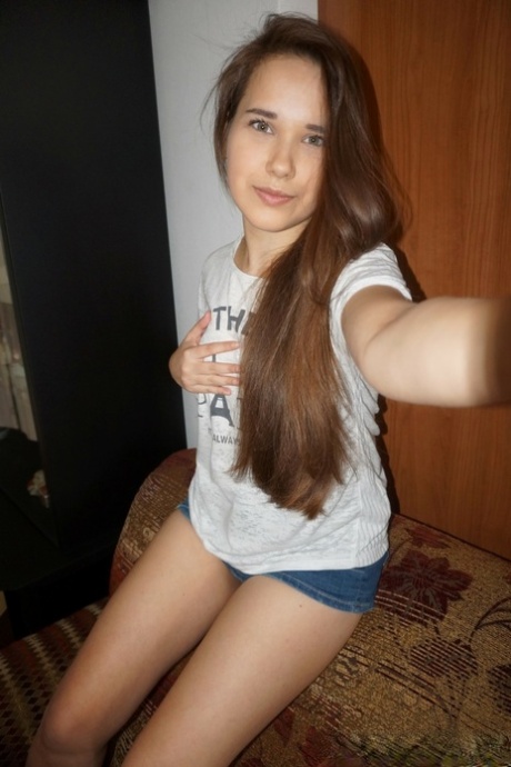 Pretty babe takes nude selfies showing her big ass and her small tits