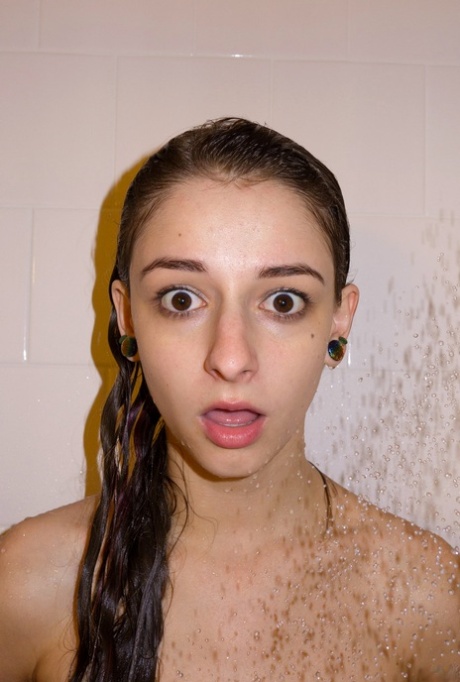 Amateur stunner Willow Hayes takes a shower after posing in sexy lingerie