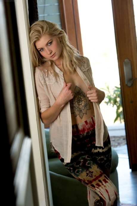 Glamorous blonde Arya Fae undresses & exposes her holes, small tits & hot ass