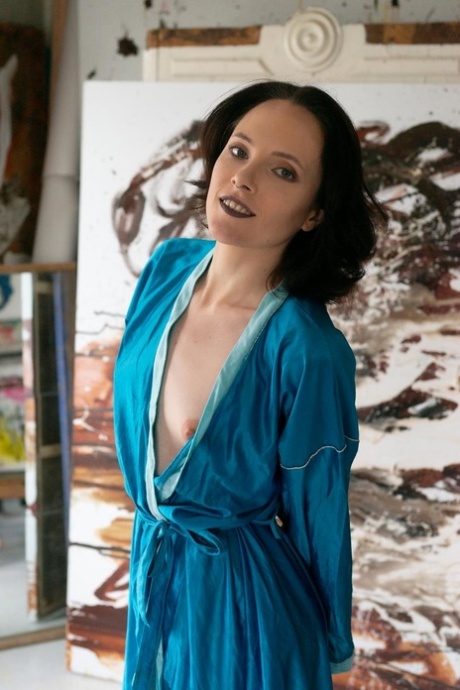 Beautiful babe shows her perfect petite body while completely naked