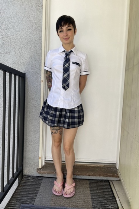 Brunette schoolgirl Stevie Moon spreads her shaved puffy pussy up close