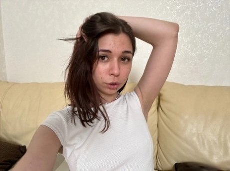 Sexy brunette shows off her natural tits in a hot selfie compilation