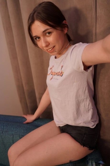 Sexy brunette shows off her natural tits in a hot selfie compilation