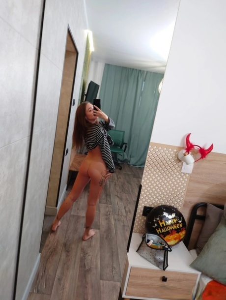 Skinny tattooed teen exposes her hot ass & pussy to take selfies in the mirror