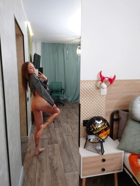 Skinny tattooed teen exposes her hot ass & pussy to take selfies in the mirror