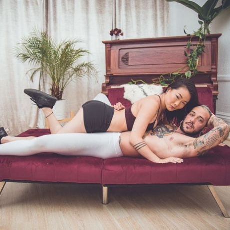 Sexy Aian teen Kaya Lin seduces a tattooed guy and gets her twat licked