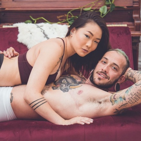 Sexy Aian teen Kaya Lin seduces a tattooed guy and gets her twat licked