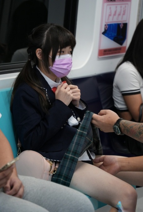 Asian schoolgirl Yuli has doggystyle sex with a senior on the train
