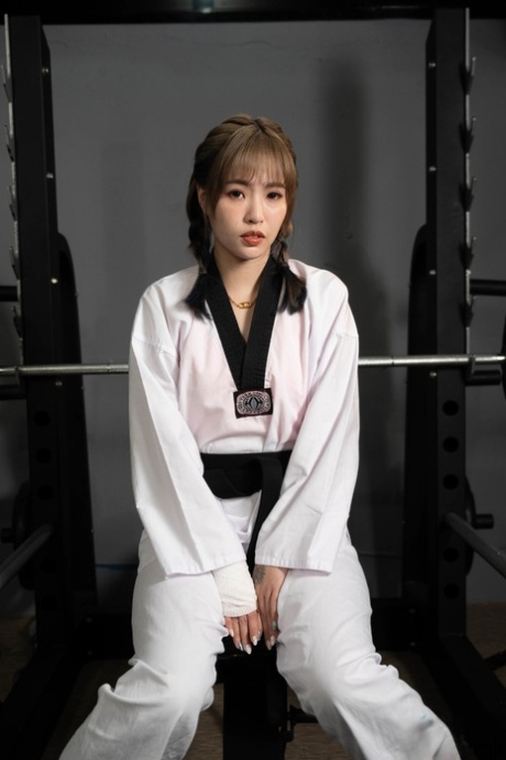 Sexy Chinese girl Bad Bad fucks her karate master during training