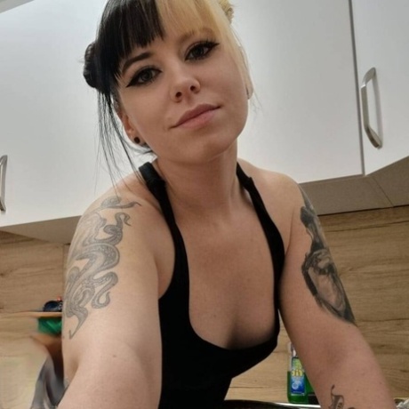 Hot amateur babe Kirajameson shows off her curves while cooking in the kitchen