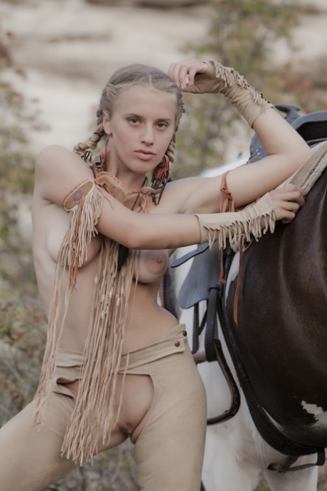Sexy blonde cowgirl babe teases with her hot love holes outdoors