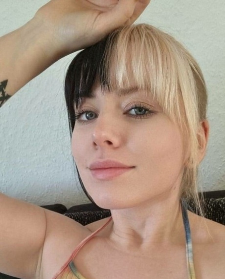 Amateur beauty Kirajameson makes silly faces while posing on camera